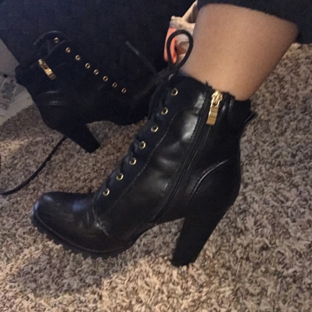 Limelight black and gold combat heel boots